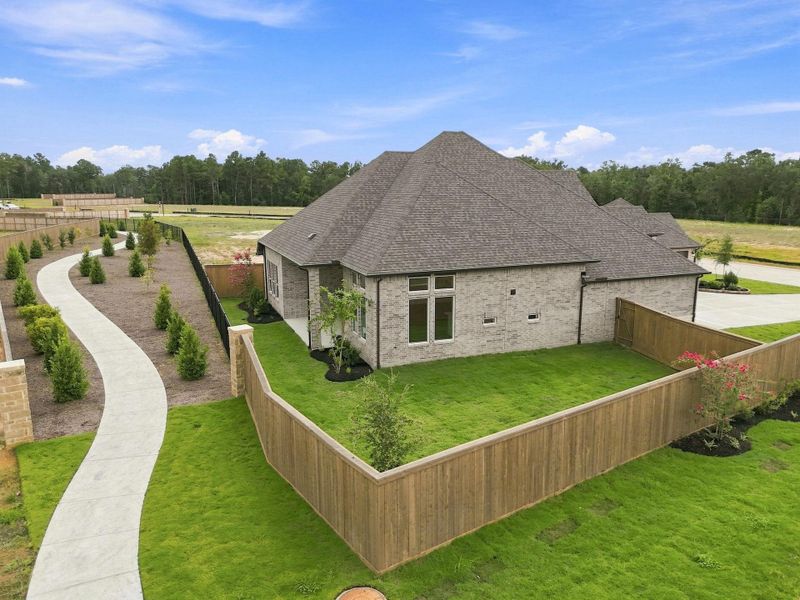Exterior details and patio area of a home in The Highlands, Porter (Image 31).