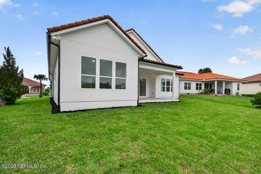 Exterior details and patio area of a home in , St. Johns (Image 43).