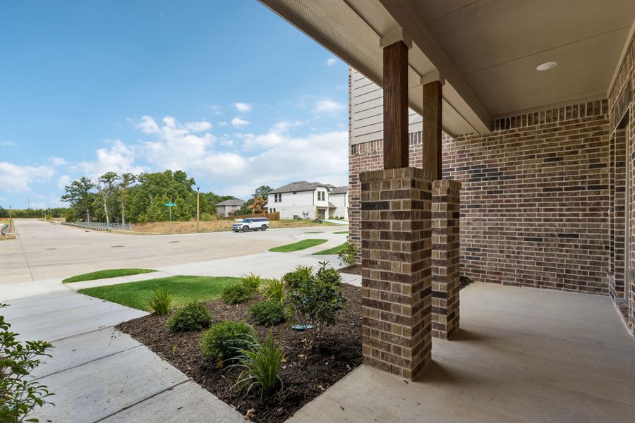 Exterior details and patio area of a home in Eagle Cove, Denton (Image 3).