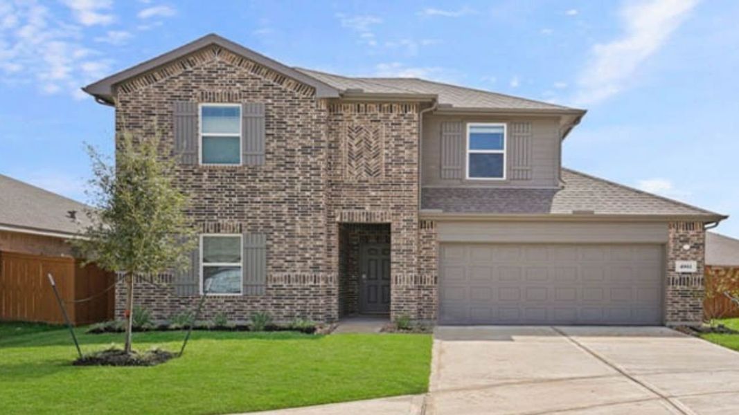 Representative exterior photo of a completed home built from the Naples by D.R. Horton in Cypress Green, Hockley, TX (Image 1).