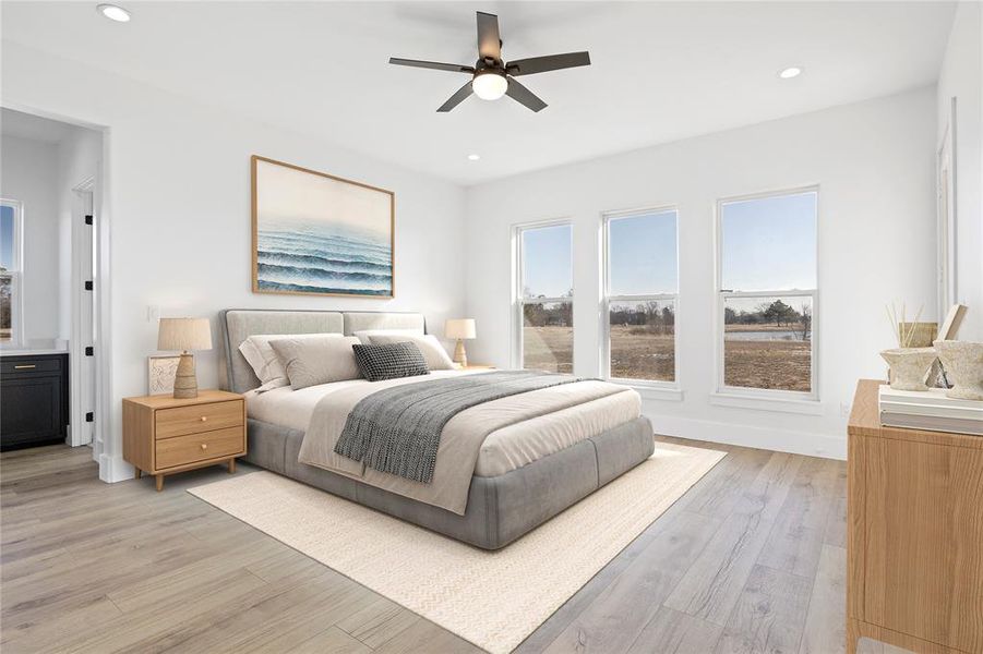 Bedroom featuring recessed lighting, light wood-style floors, baseboards, and a ceiling fan Bedroom featuring recessed lighting, light wood-style floors, baseboards, and a ceiling fan