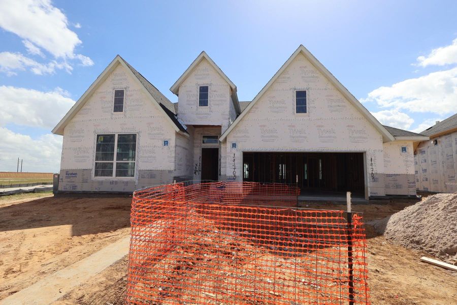 In-progress construction of a new home in Dunham Pointe, Cypress, TX (Image 49).