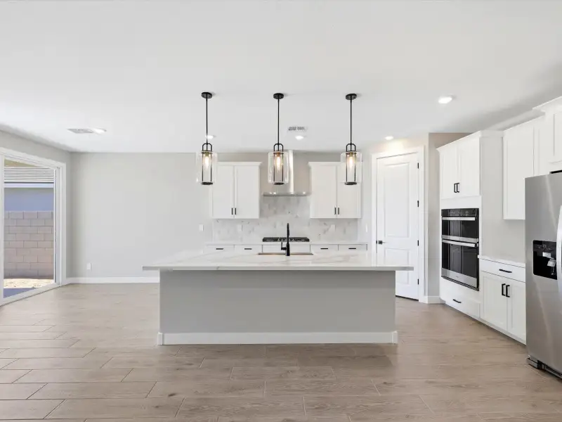 Furnished interior view inside a new home in Blossom Rock Reserve Series, Apache Junction (Image 4).