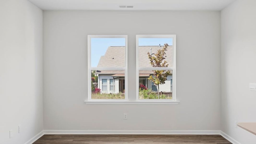 Spacious, unfurnished interior of a new home in Tanglewood Townes, Greenville (Image 19).