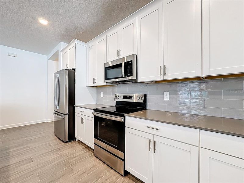 Furnished interior view inside a new home in Bridgewalk, St. Cloud (Image 6).