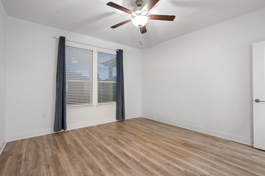 Light & Bright with beautiful LVP upgraded flooring and ceiling fan