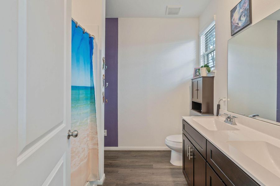 Furnished interior view inside a new home in The Pines At Seven Coves, Willis (Image 13). Furnished interior view inside a new home in The Pines At Seven Coves, Willis (Image 13).