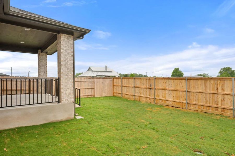 Exterior details and patio area of a home in Flora, Hutto (Image 21).