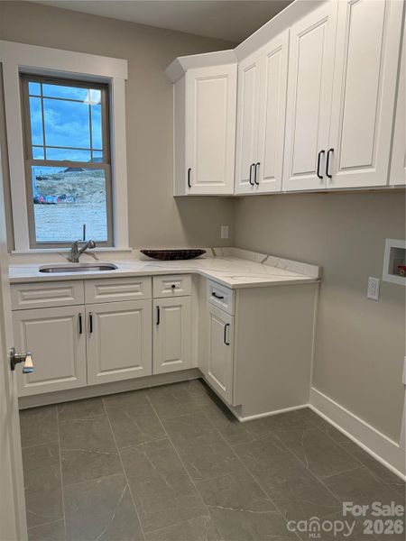 Laundry Room with Wet Sink and Cabinets Laundry Room with Wet Sink and Cabinets