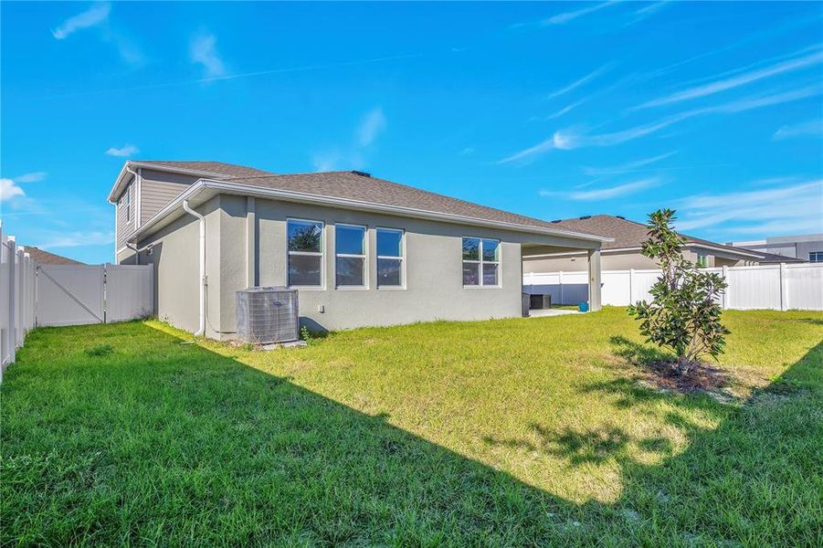 Exterior details and patio area of a home in Meadowlark Landing, Apopka (Image 23).