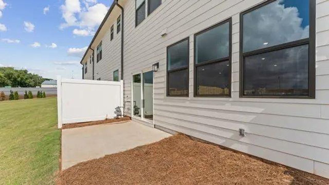 Exterior details and patio area of a home in Magnolia Square, Austell (Image 14).