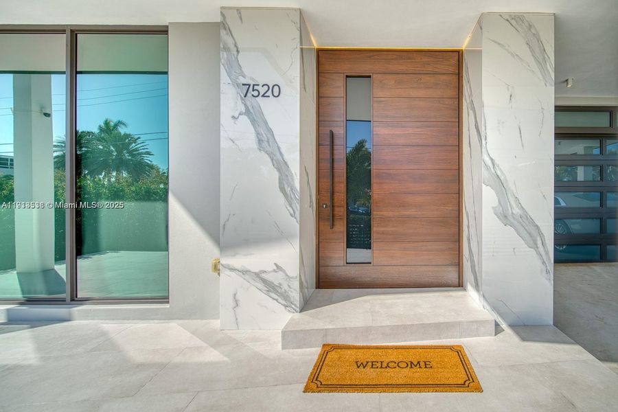 Exterior details and patio area of a home in , North Bay Village (Image 24).