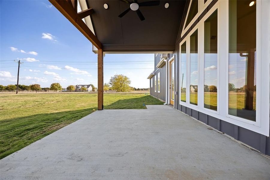 View of patio with ceiling fan