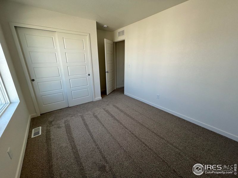 Spacious, unfurnished interior of a new home in Liberty Draw, Evans (Image 12).