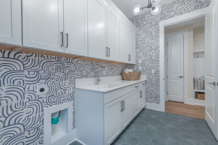 Representative furnished interior of a home built from the Stella II by Riverside Homes in Hidden Creek at SilverLeaf, St. Augustine (Image 62).