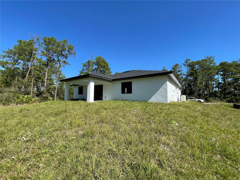 Exterior details and patio area of a home in , Lehigh Acres (Image 22). Exterior details and patio area of a home in , Lehigh Acres (Image 22).