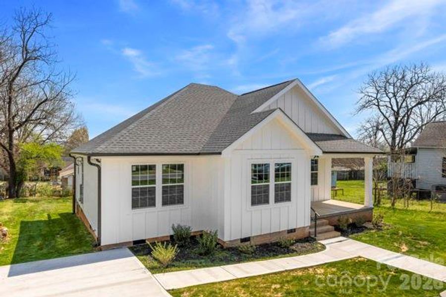 Front exterior of a new home in , Kings Mountain, NC, highlighting curb appeal (Image 13).