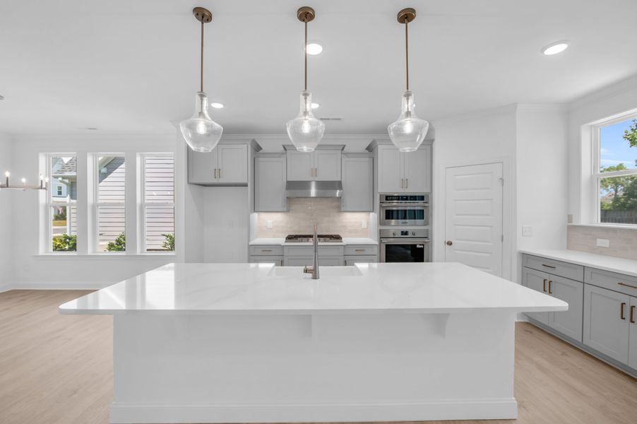 Representative furnished interior of a home built from the The Highland by RobuckHomes in WyndWater, Hampstead (Image 12). Representative furnished interior of a home built from the The Highland by RobuckHomes in WyndWater, Hampstead (Image 12).