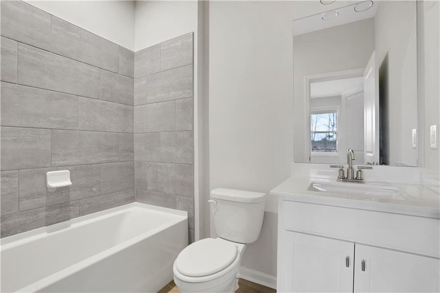 Furnished interior view inside a new home in Towne Village at Suwanee Dam, Sugar Hill (Image 14). Furnished interior view inside a new home in Towne Village at Suwanee Dam, Sugar Hill (Image 14).