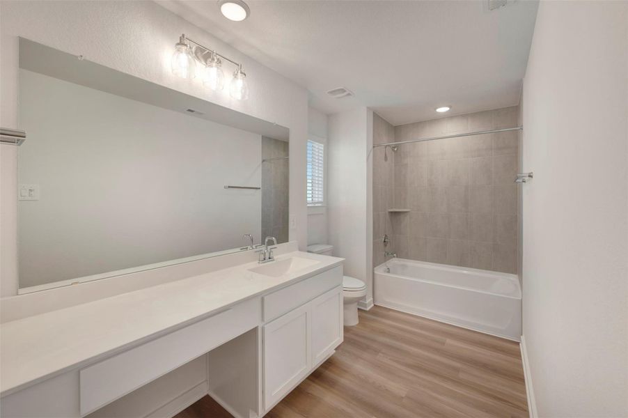 Furnished interior view inside a new home in Wildrye, Waller (Image 13).