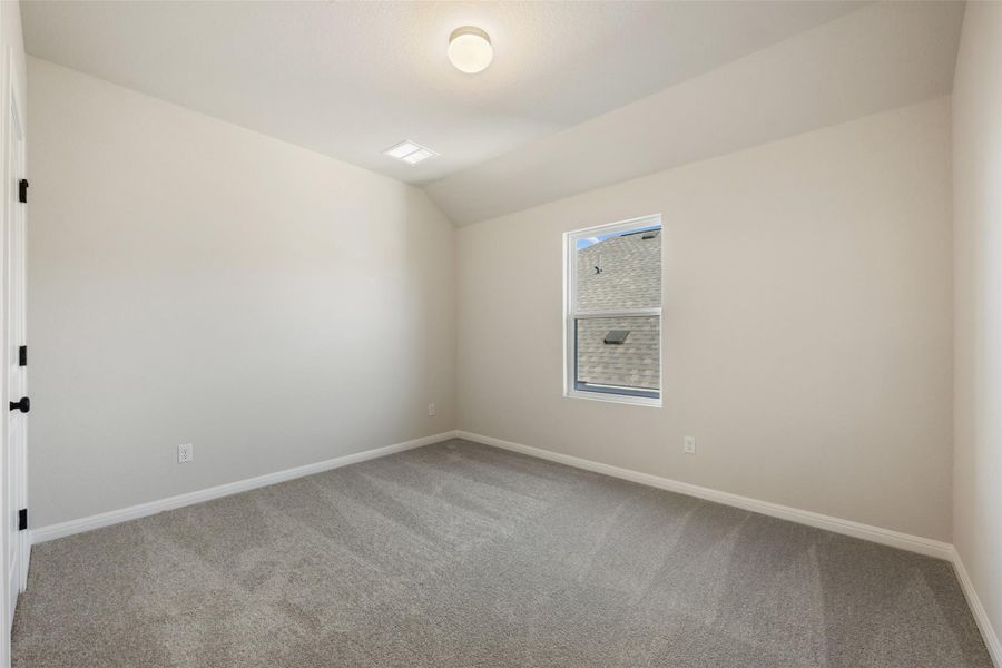 Spacious, unfurnished interior of a new home in The Colony 50s, Bastrop (Image 17).