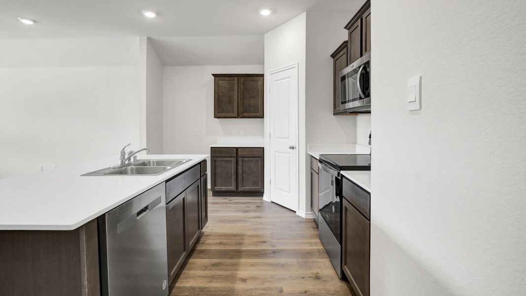Furnished interior view inside a new home in Valor Farms, Royse City (Image 7).