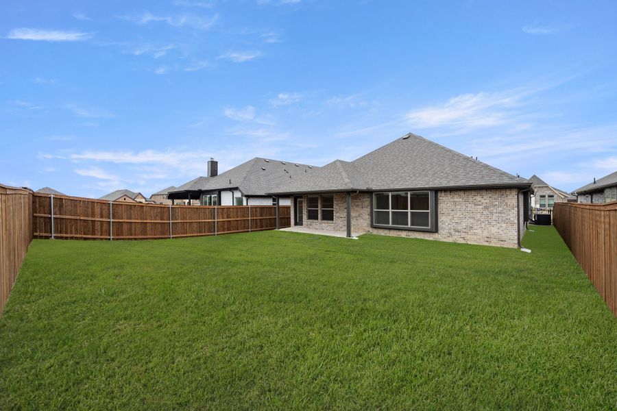 Exterior details and patio area of a home in Silo Mills, Joshua (Image 23).
