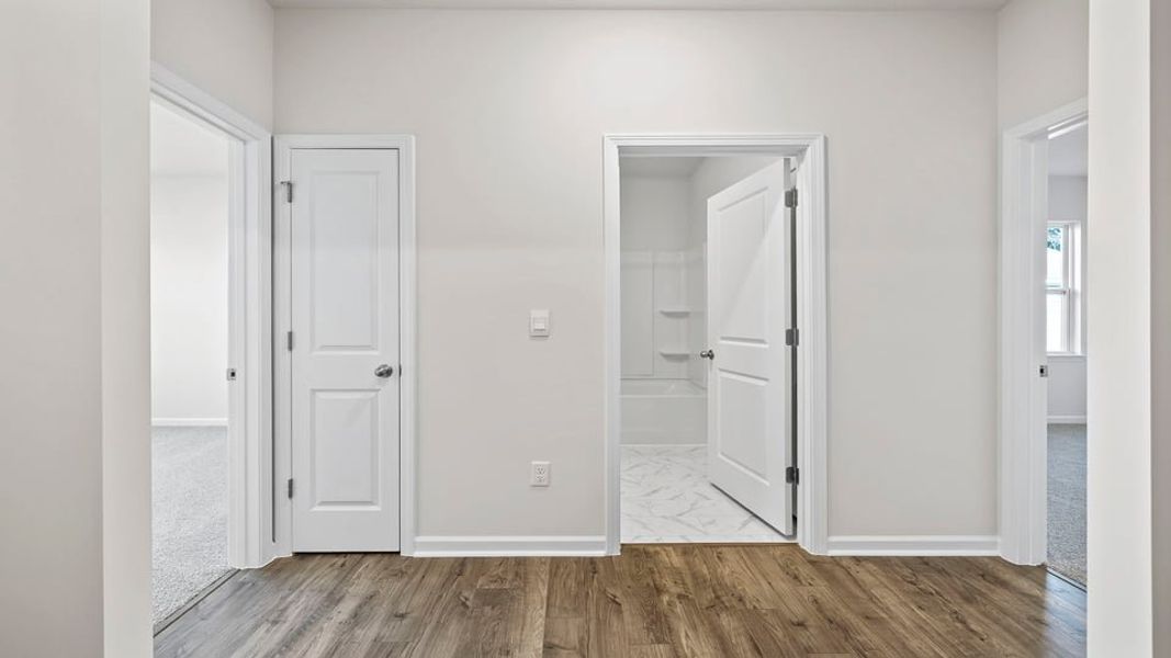 Spacious, unfurnished interior of a new home in Bentley Park, Greenwood (Image 11). Spacious, unfurnished interior of a new home in Bentley Park, Greenwood (Image 11).