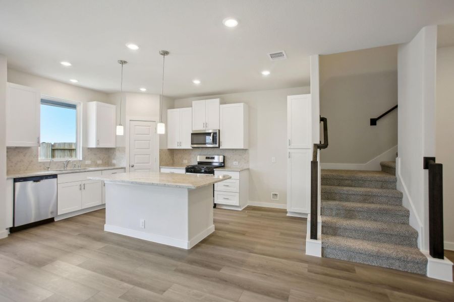 Photo is not of the actual home, but is an inspirational photo of builder’s model home and may depict options, furnishings, and/or decorator features that are not included