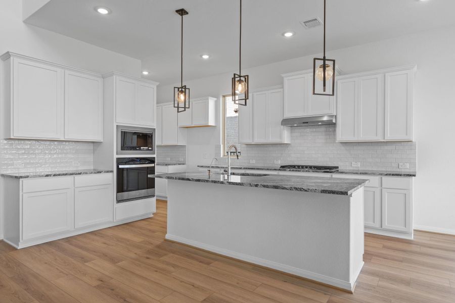 Furnished interior view inside a new home in Bridgeland 55', Cypress (Image 15).