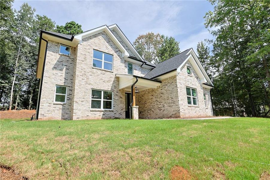 Exterior details and patio area of a home in , McDonough (Image 25).