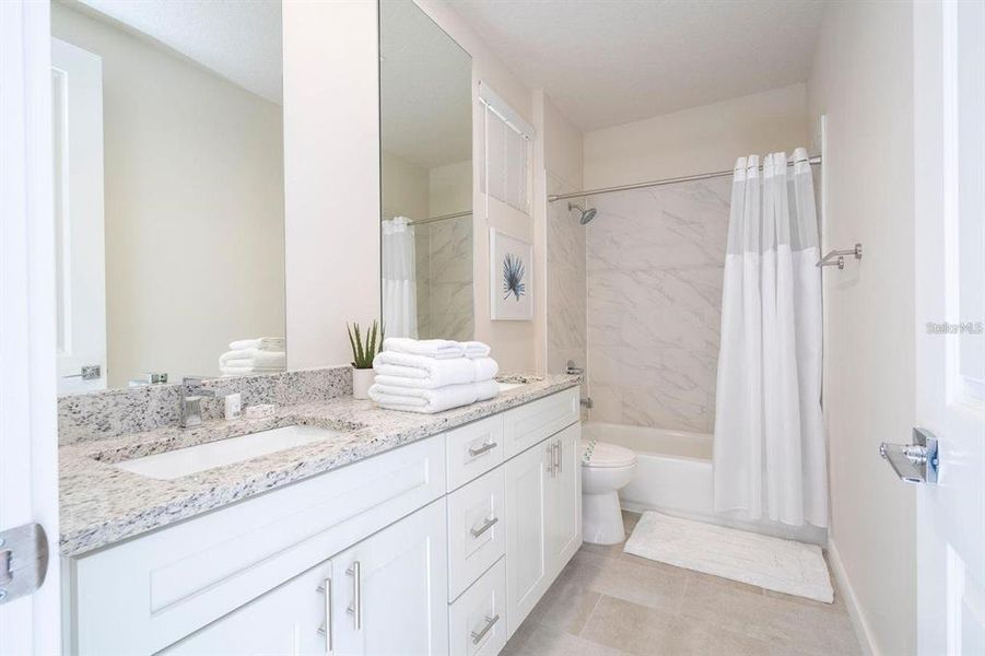 Furnished interior view inside a new home in , Kissimmee (Image 9). Furnished interior view inside a new home in , Kissimmee (Image 9).