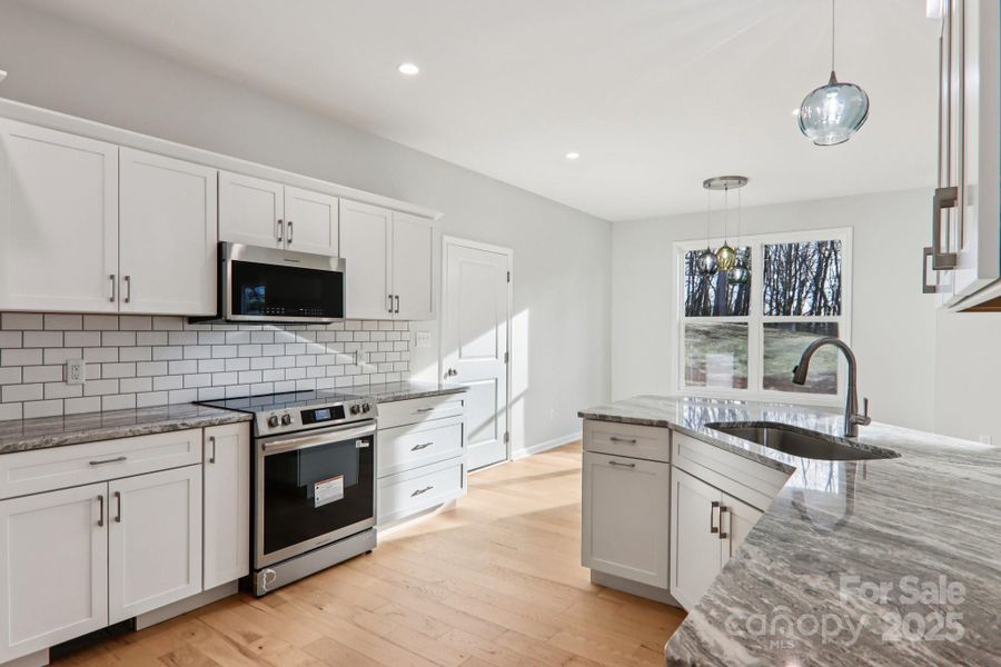 Furnished interior view inside a new home in , Candler (Image 9).
