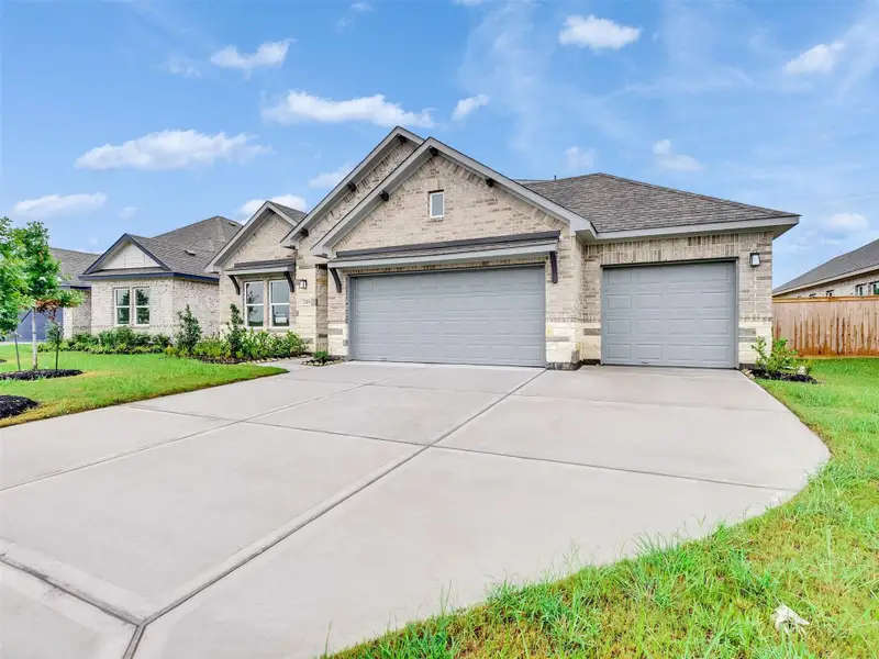 Front exterior of a new home in , Angleton, TX, highlighting curb appeal (Image 2). Front exterior of a new home in , Angleton, TX, highlighting curb appeal (Image 2).