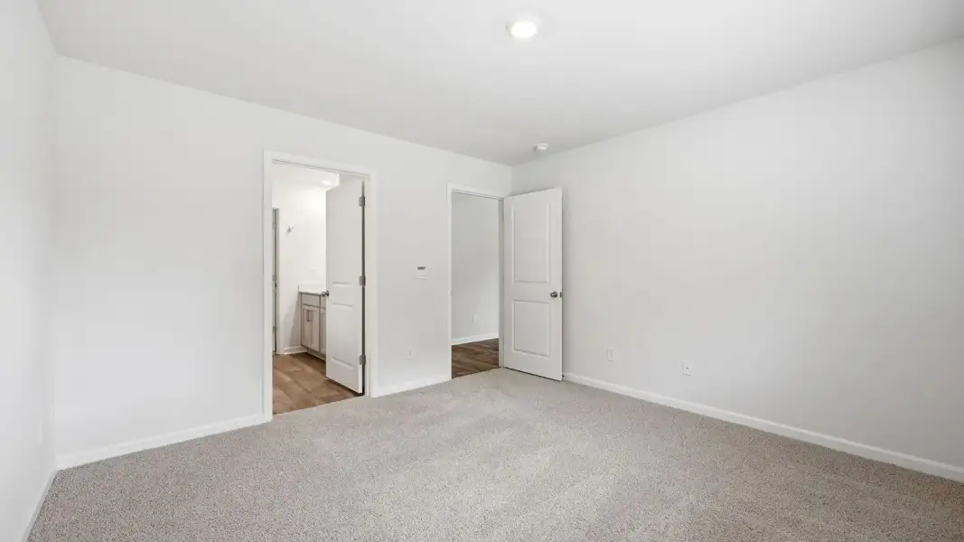 Representative unfurnished interior of a home built from the Freeport II - Express by D.R. Horton in Savannah Place, Wilson (Image 19).