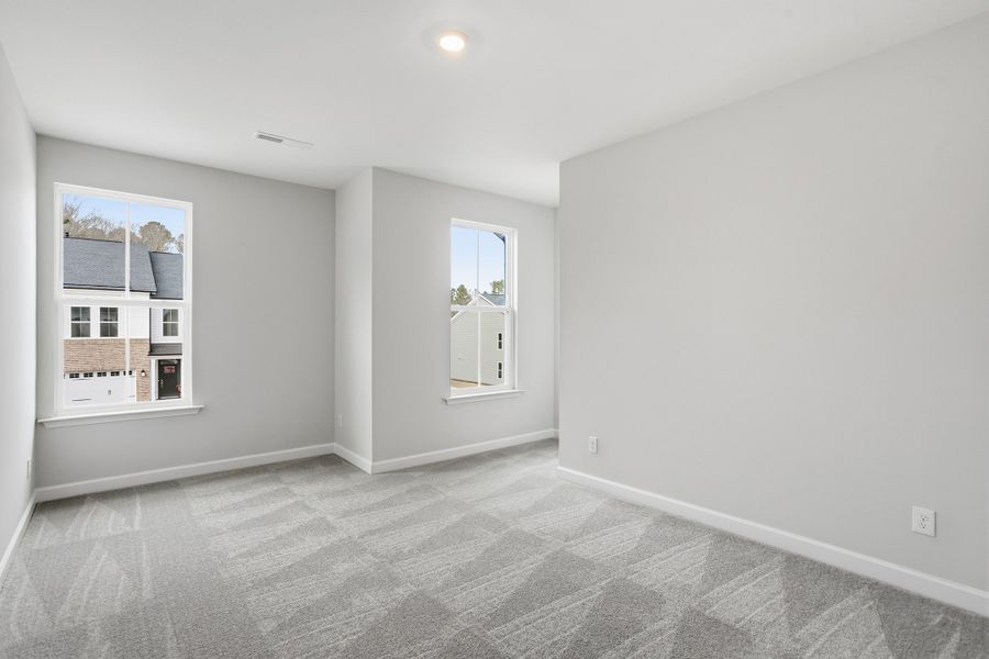 Spacious, unfurnished interior of a new home in Ovation at Sweetbrier, Durham (Image 27).