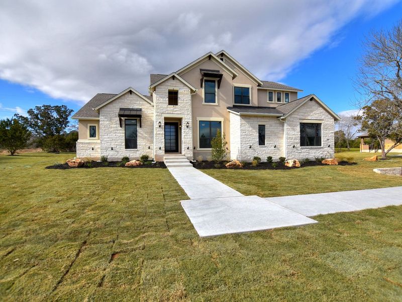Representative exterior photo of a completed home built from the Madera II by Giddens Homes in Scofield Farms Estates, Georgetown, TX (Image 34).