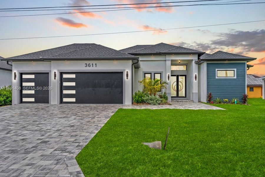 Front exterior of a new home in , Cape Coral, FL, highlighting curb appeal (Image 28).
