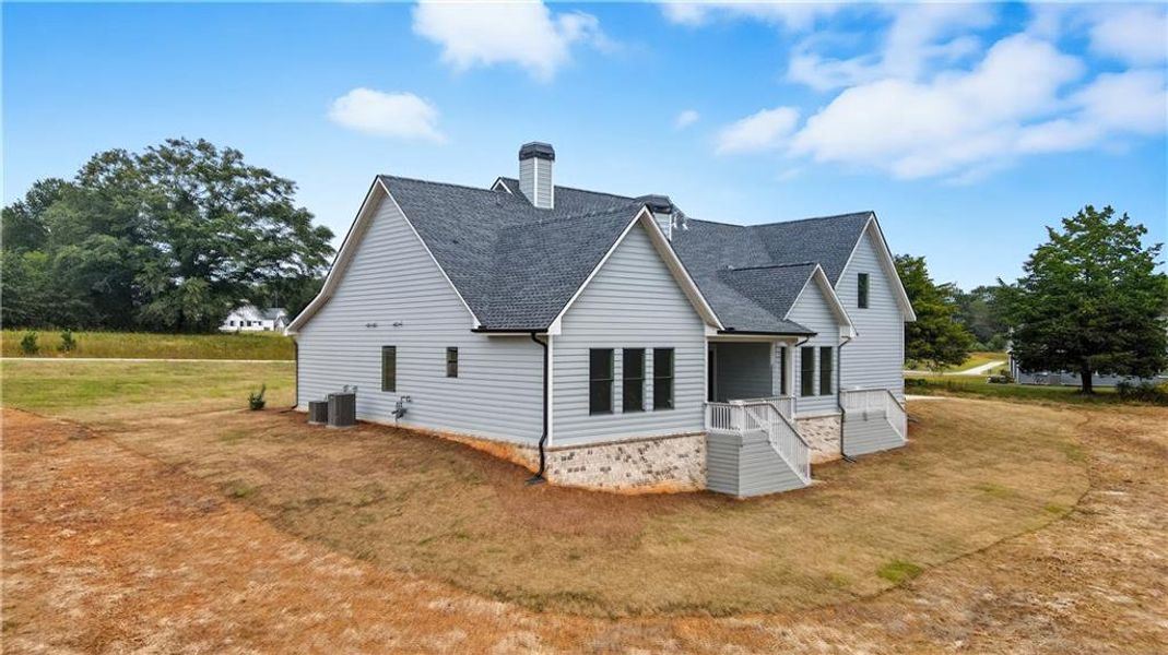 Exterior details and patio area of a home in Old Town Estates, Dacula (Image 38).