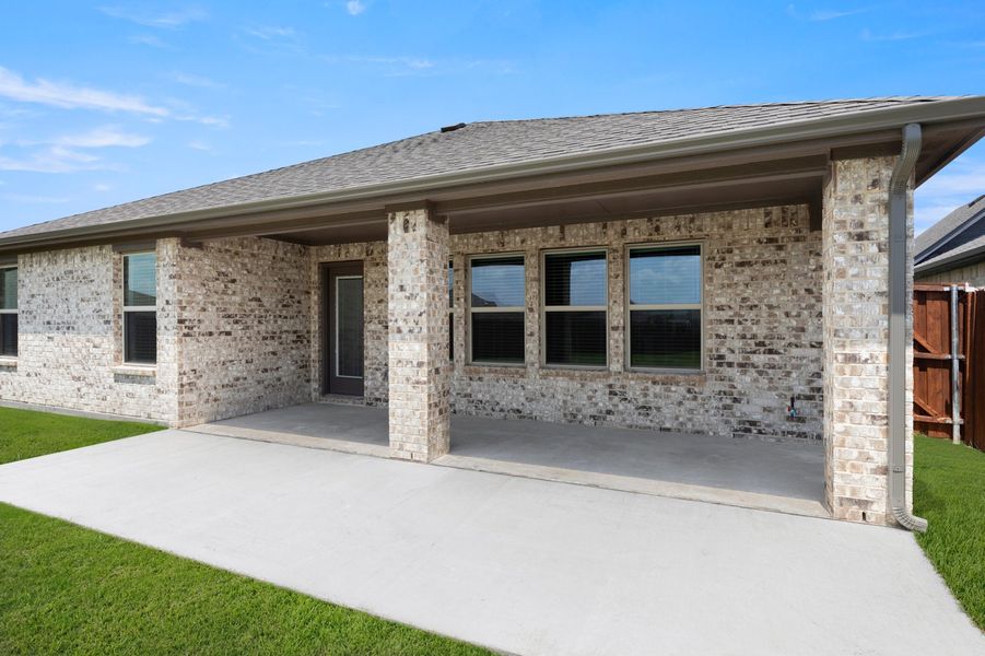 Front exterior of a new home in Northspur, Terrell, TX, highlighting curb appeal (Image 28). Front exterior of a new home in Northspur, Terrell, TX, highlighting curb appeal (Image 28).