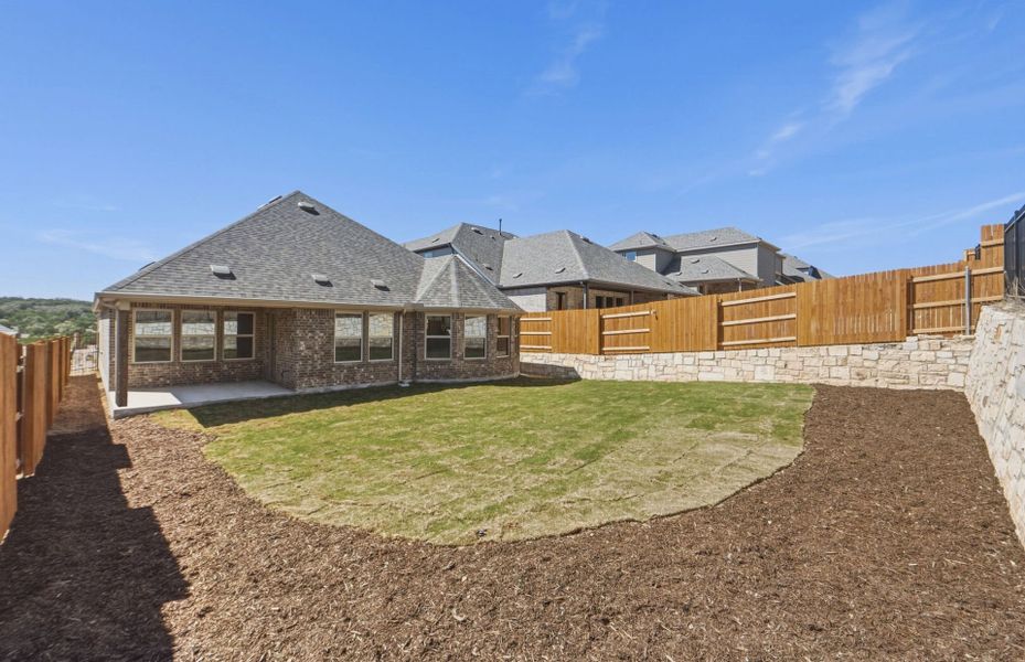 Exterior details and patio area of a home in West Cypress Hills, Spicewood (Image 25). Exterior details and patio area of a home in West Cypress Hills, Spicewood (Image 25).