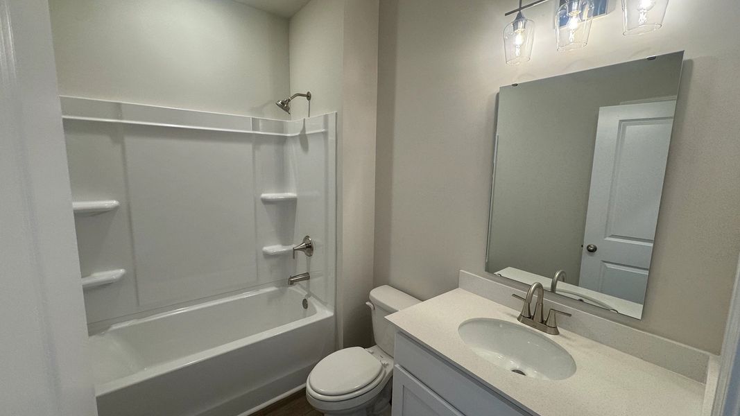 Furnished interior view inside a new home in Watson Hill, Summerville (Image 5).