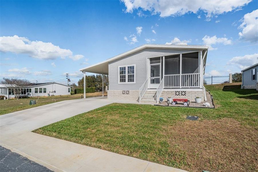 Exterior details and patio area of a home in , Zephyrhills (Image 24).