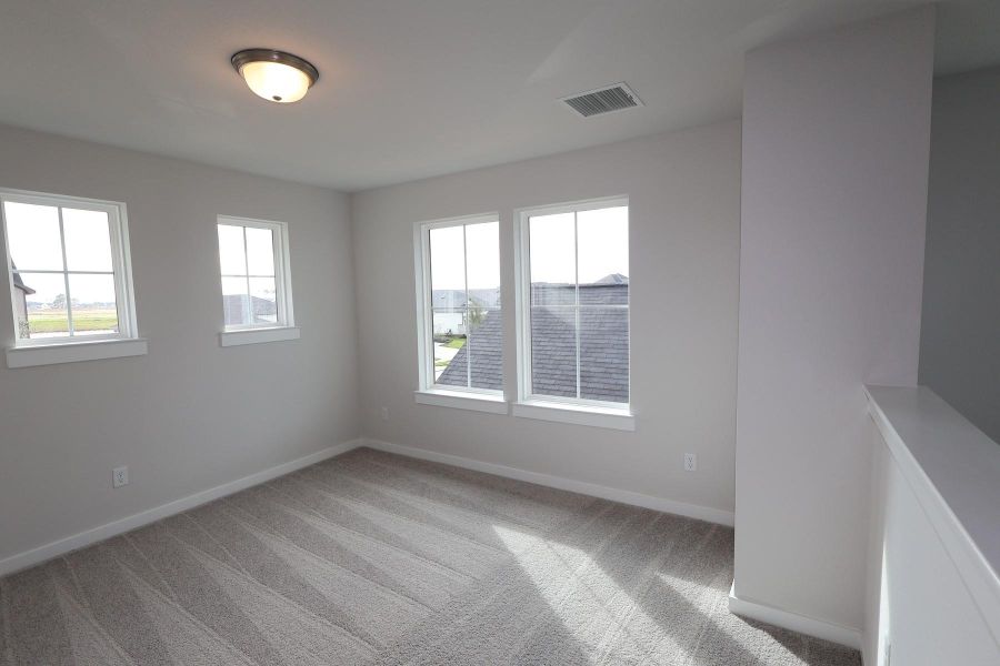 Spacious, unfurnished interior of a new home in The Cove at Mason Woods, Cypress (Image 13).