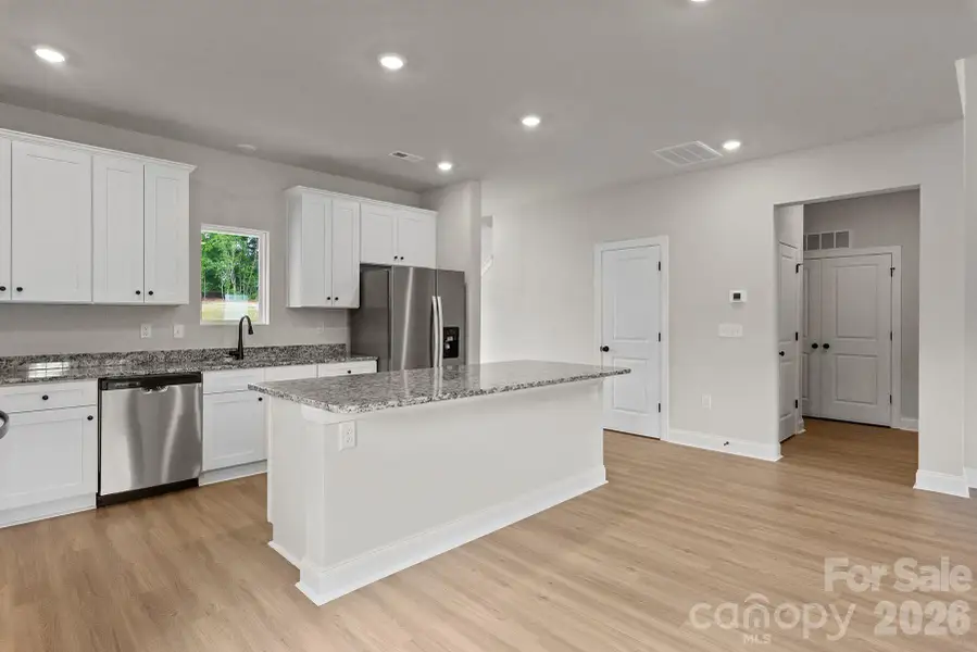 Furnished interior view inside a new home in Ascot Woods, Charlotte (Image 4).