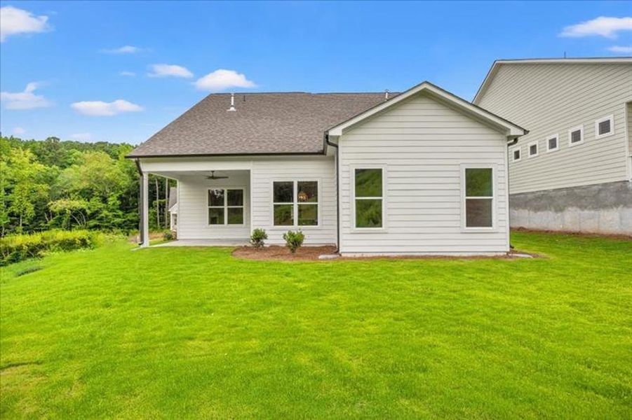 Front exterior of a new home in Cooks Farm, Woodstock, GA, highlighting curb appeal (Image 28).