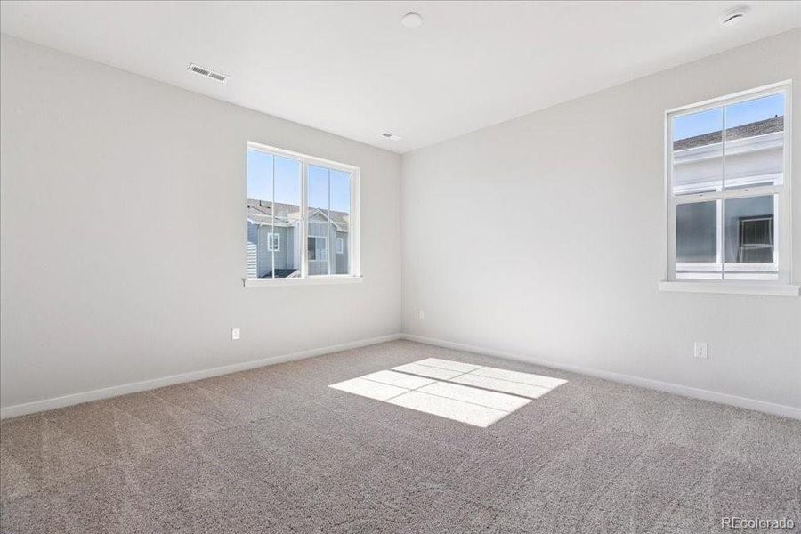 Spacious, unfurnished interior of a new home in Paired Homes at Alder Creek, Parker (Image 15).