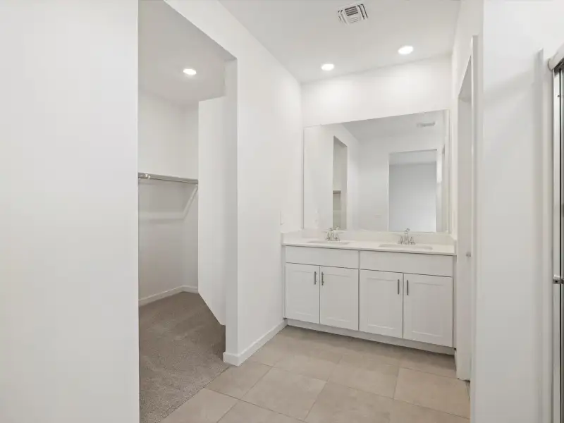 Furnished interior view inside a new home in Silva Farms - Estate Series, Goodyear (Image 3).
