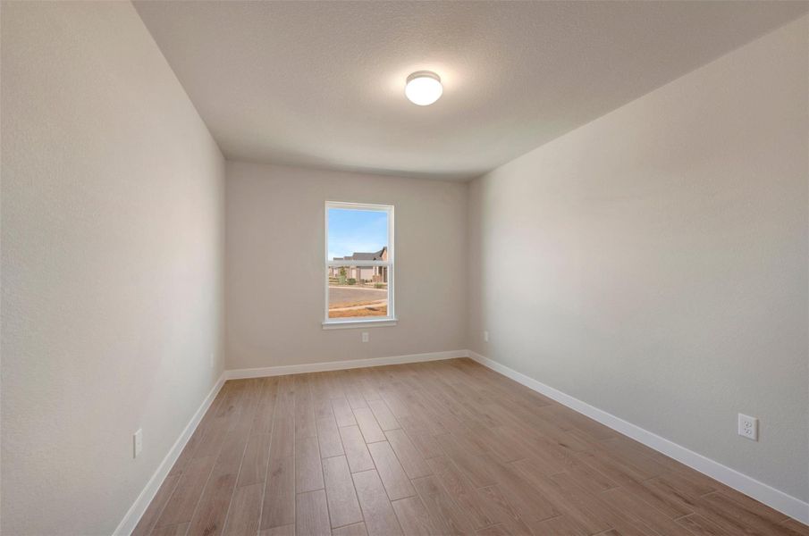 Spacious, unfurnished interior of a new home in Willow Springs, Buda (Image 17).