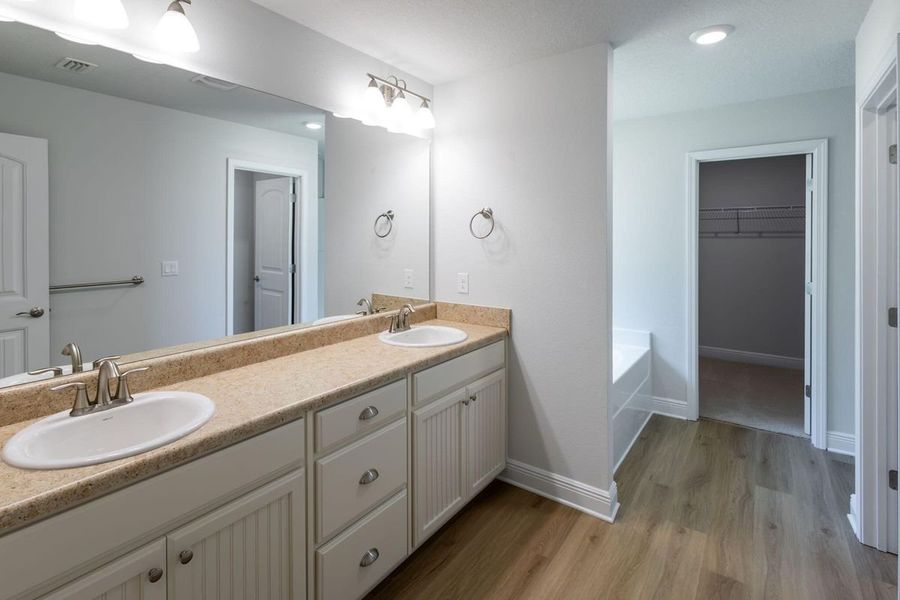 Representative furnished interior of a home built from the 2005 by Adams Homes in Parkland Place, Pace (Image 7).